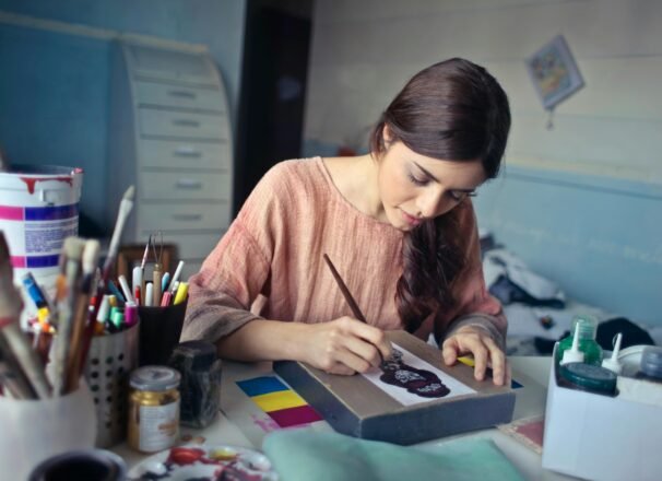 student doing creative education