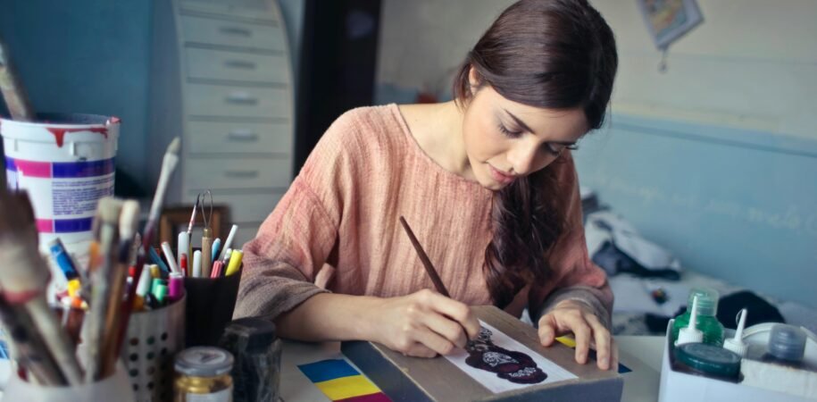 student doing creative education